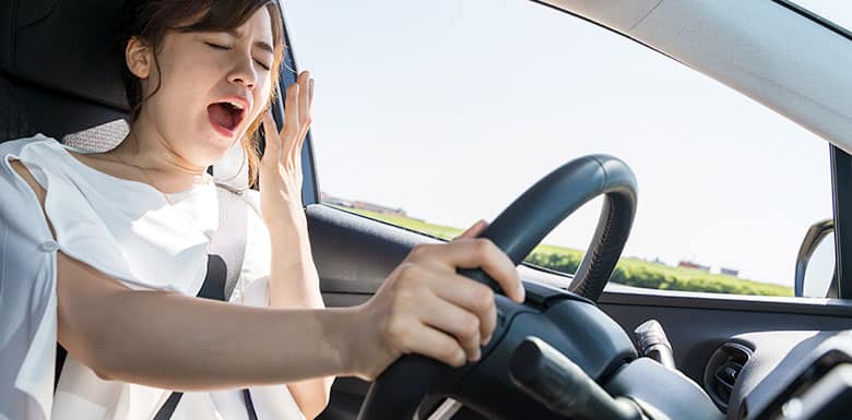 Woman-Engaging-in-Drowsy-Driving