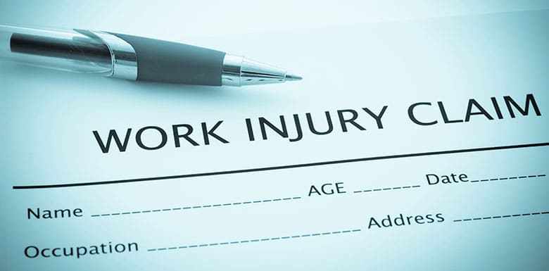 Work injury claim sheet and pen