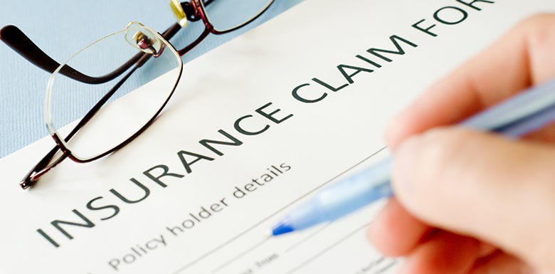 Filling out insurance claim form