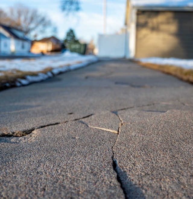 Cracks in driveway pavement